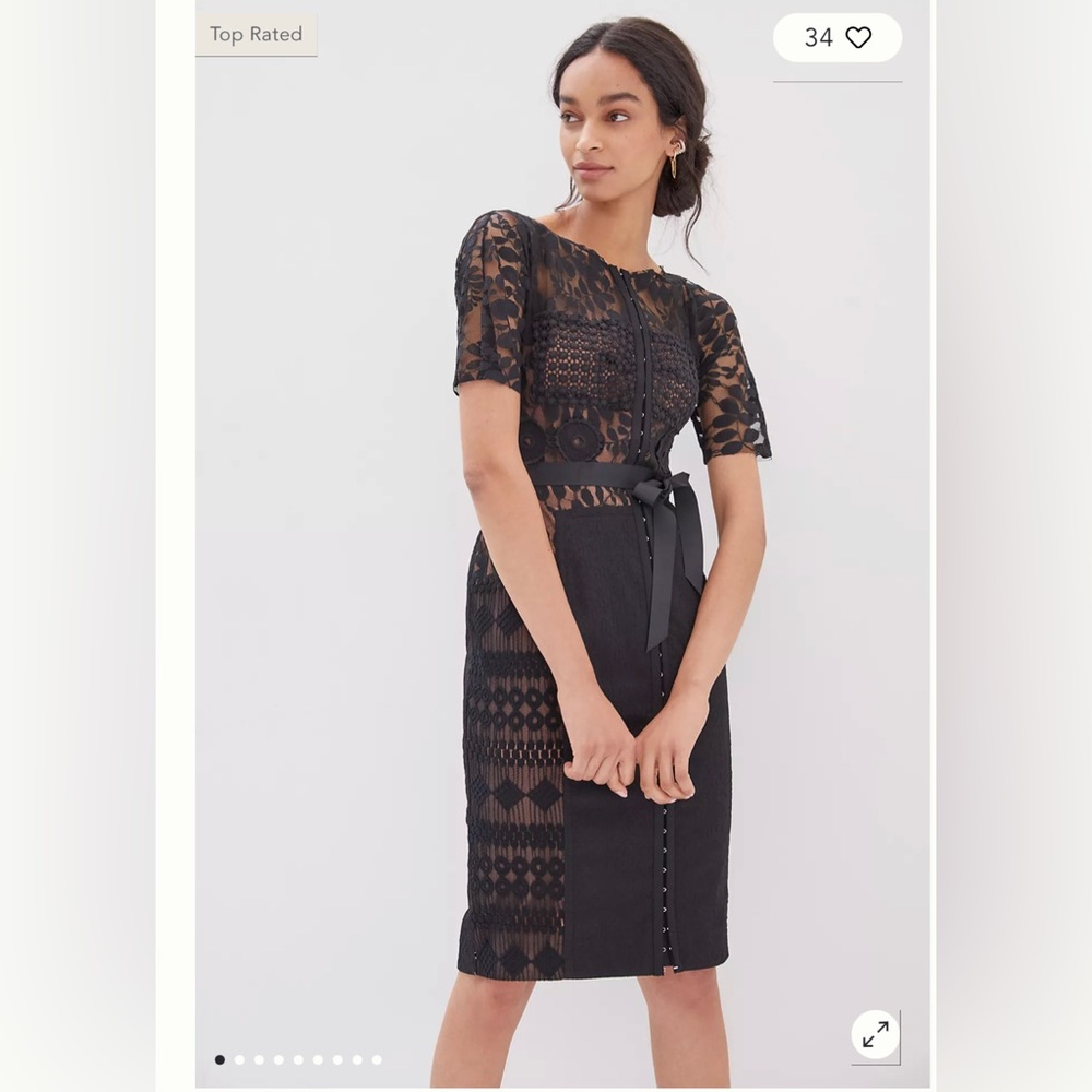 Beautiful black lace cocktail dress. Byron Lars designer.